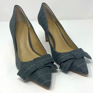 Grey and white pumps